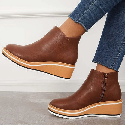 Bottines femme zippées sur le côté à semelle rayée