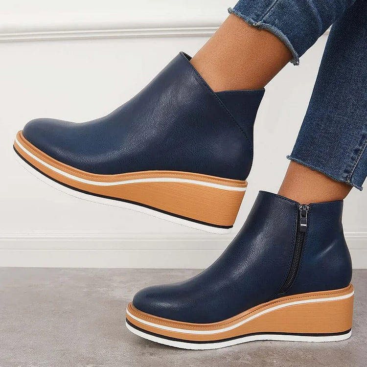Bottines femme zippées sur le côté à semelle rayée