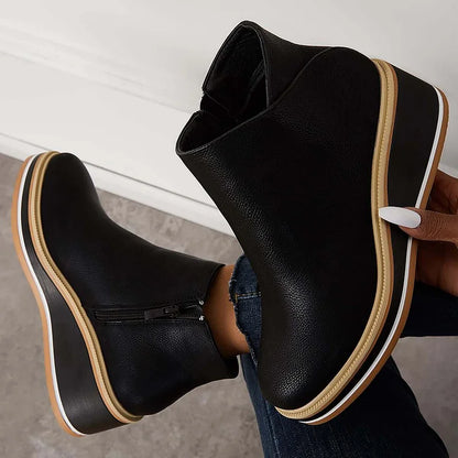 Bottines femme zippées sur le côté à semelle rayée