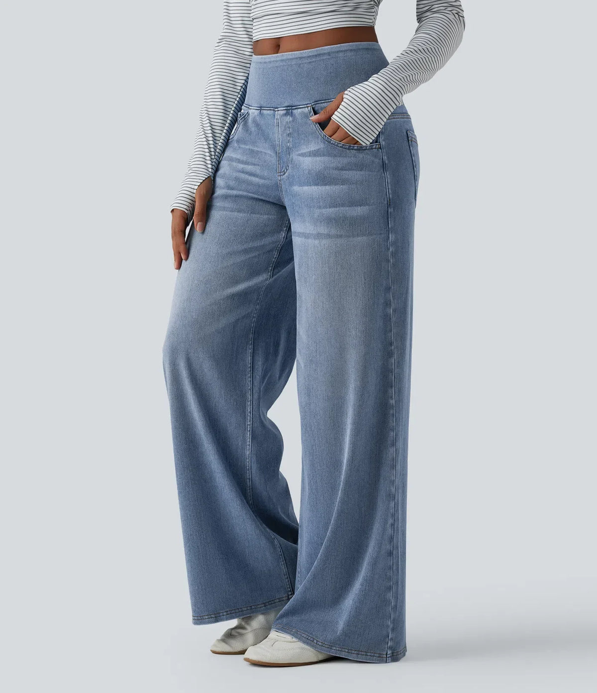 Jean large délavé, détail de la ceinture à passants