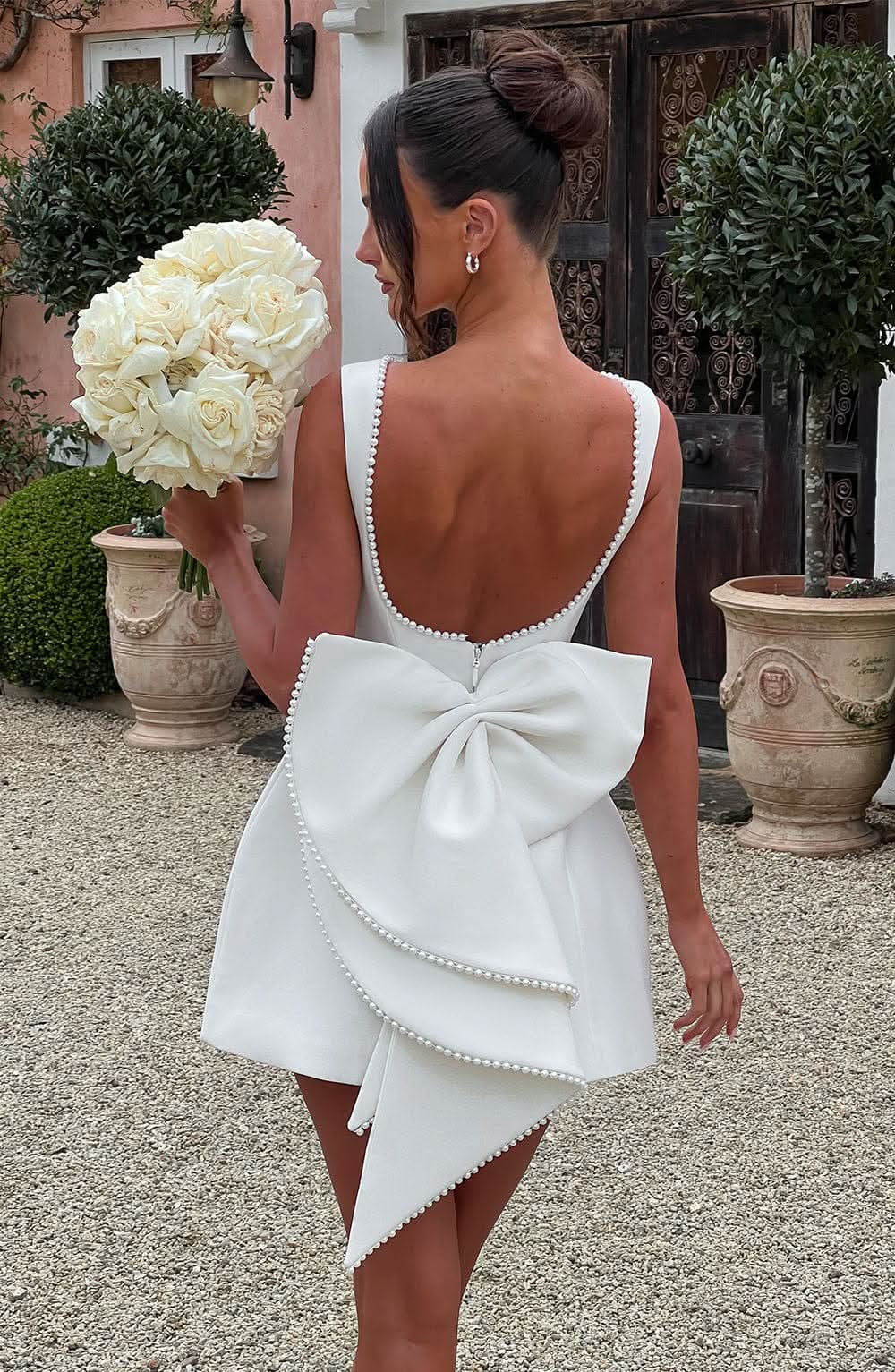 Célestine robe mini perlée à nœud blanc