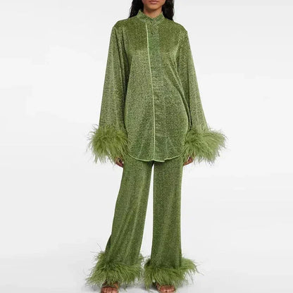 Ensemble deux pièces pailleté bordé de plumes