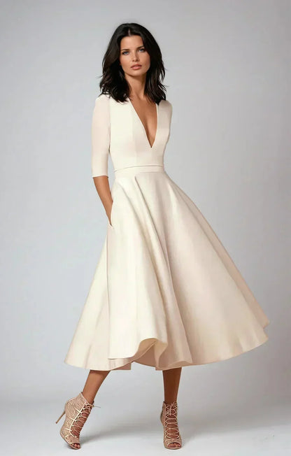 Victorine | Robe Midi Évasée Col V à Poches