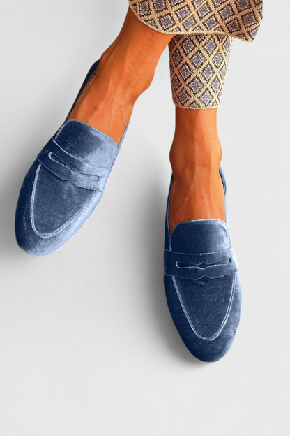 Mocassins penny bleus à barrette cousue sur le dessus