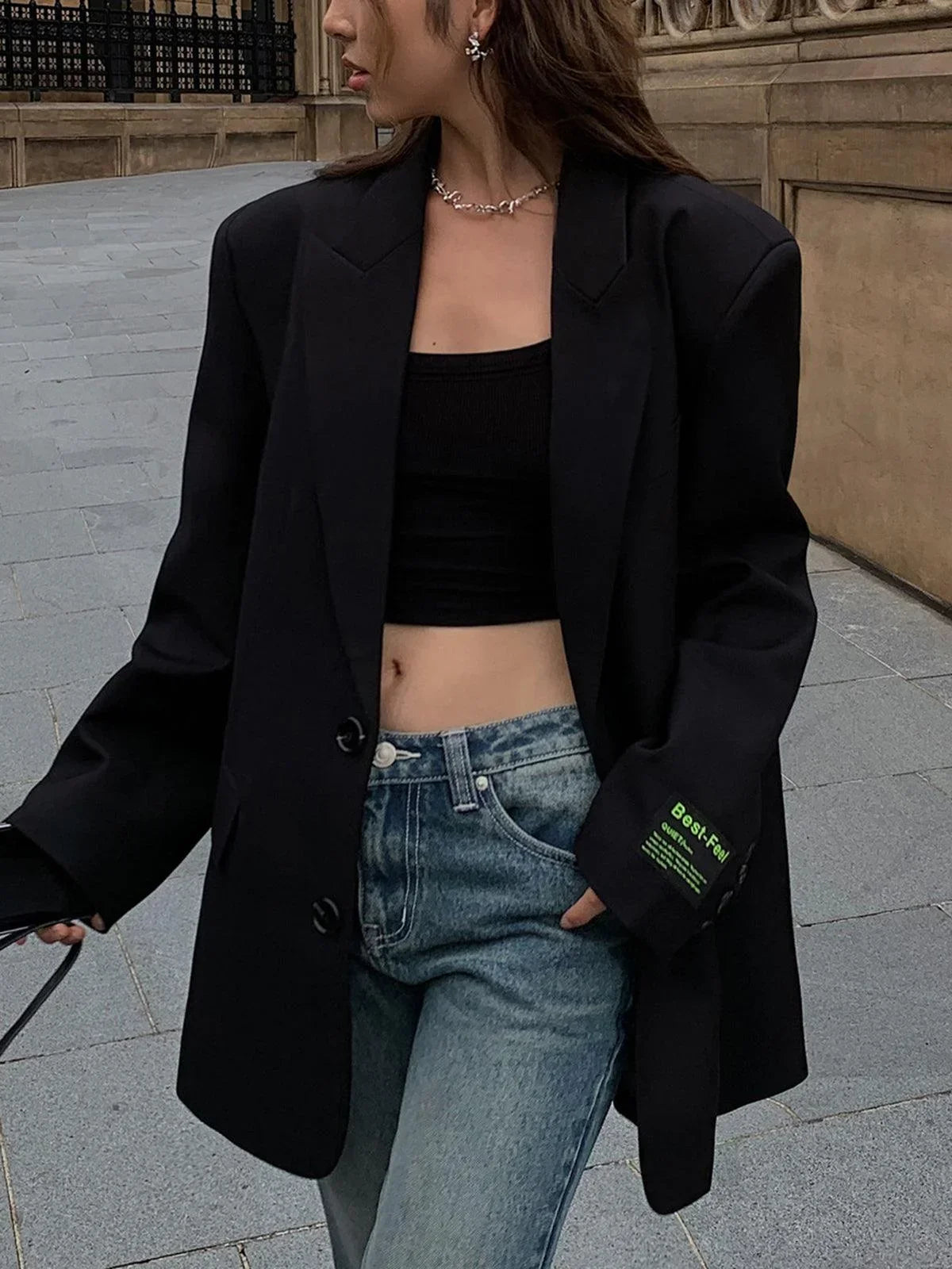 Blazer oversize boutonné, détail des poches